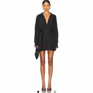 Oversized Shirt Flared Mini Dress in Black
Norma Kamali